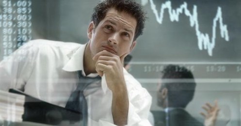 Young -investor -analyzing -charts -digital -display -wall _573x 300 (2)